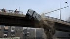 Protestors push police truck off Cairo bridge