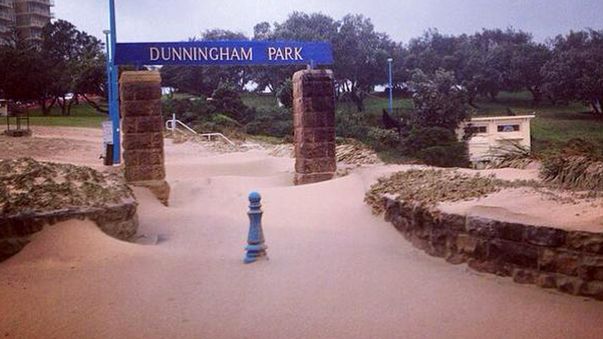 The entrance to the popular Dunningham Park, Coogee, swamped in beach sand. (Twitter - @CoogeeBayHotel)