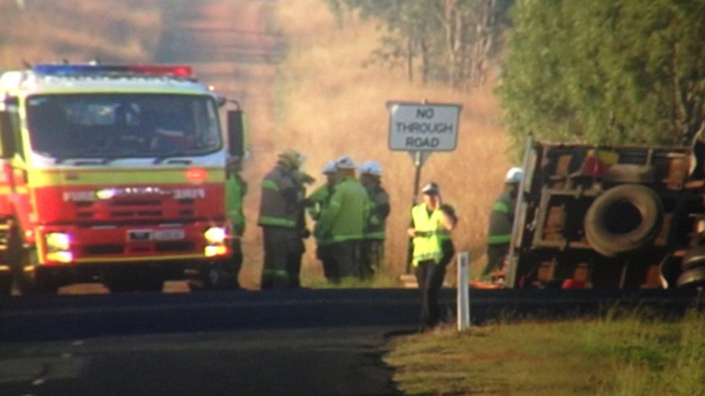 Driver dies after car crushed underneath truck in horrific crash at