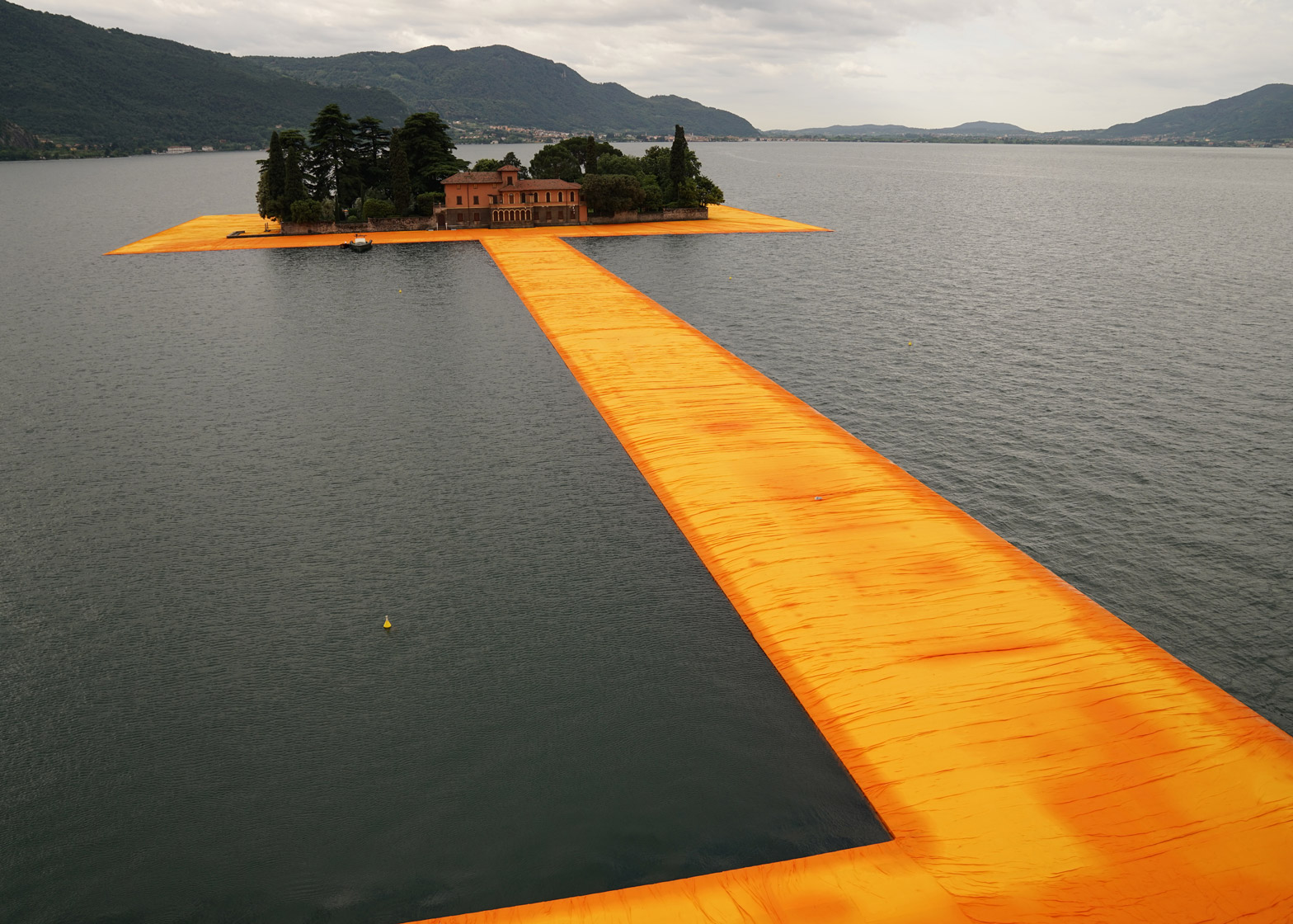 Walking on water: Artist Christo’s Floating Piers connect Italian lake