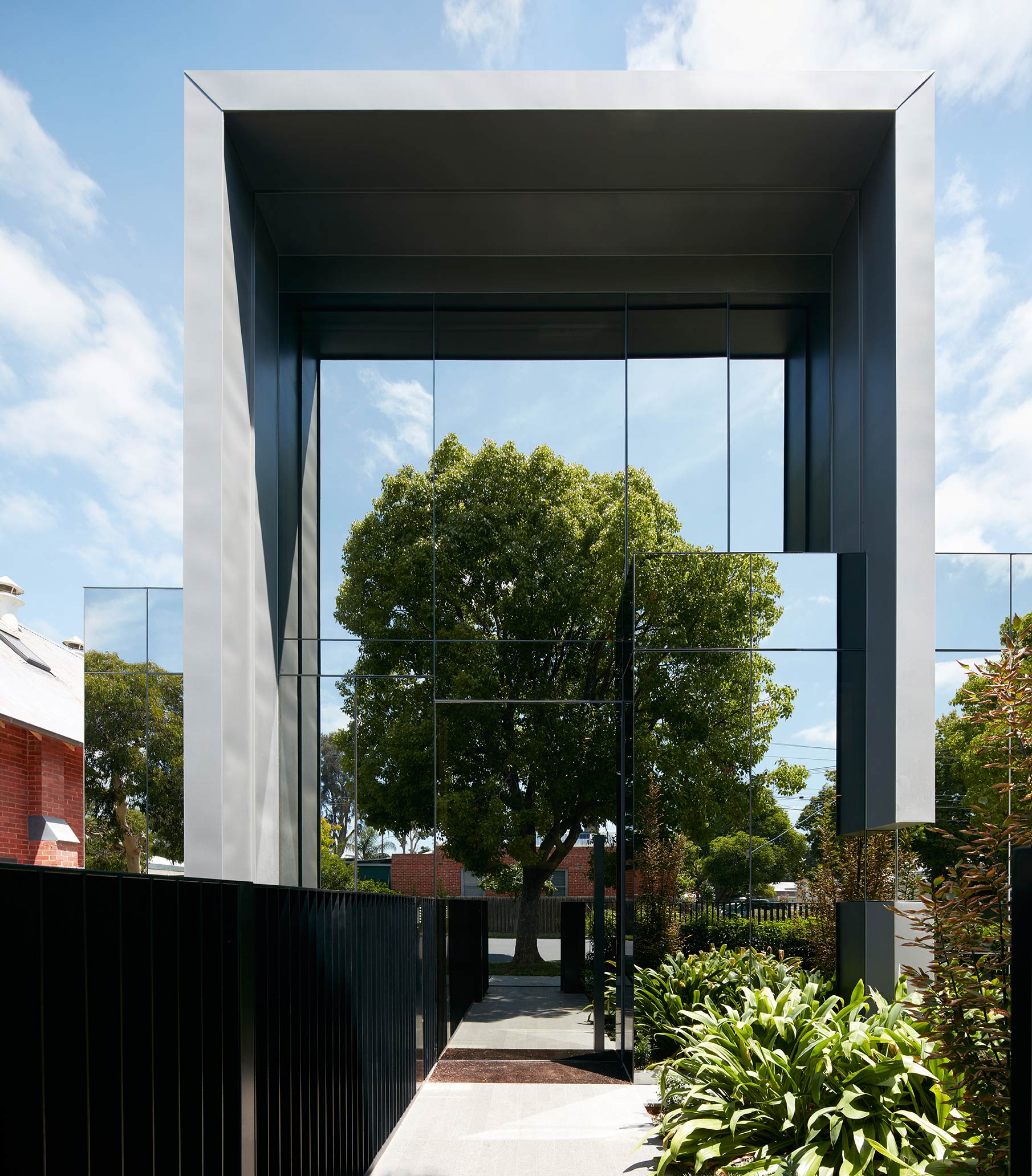 Mirrorclad home reflects its surrounds 9Homes