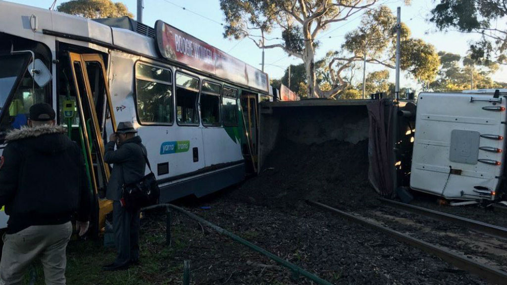 Up to 20 people treated after truck and tram collision in Melbourne