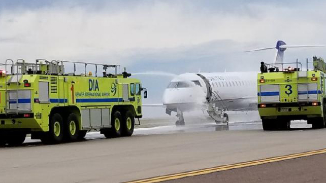 United jet catches on fire at Denver airport