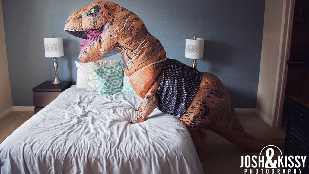 Sexy Dinosaur Costume
 Woman poses for pre wedding boudoir shoot in T Rex costume