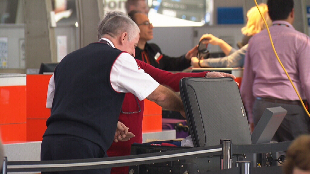 Travellers have reported delays through security at major airports nation-wide. (9NEWS)