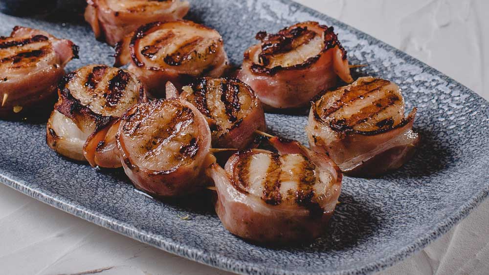 Merv Hughes' baconwrapped scallops with spicy mayo 9Kitchen