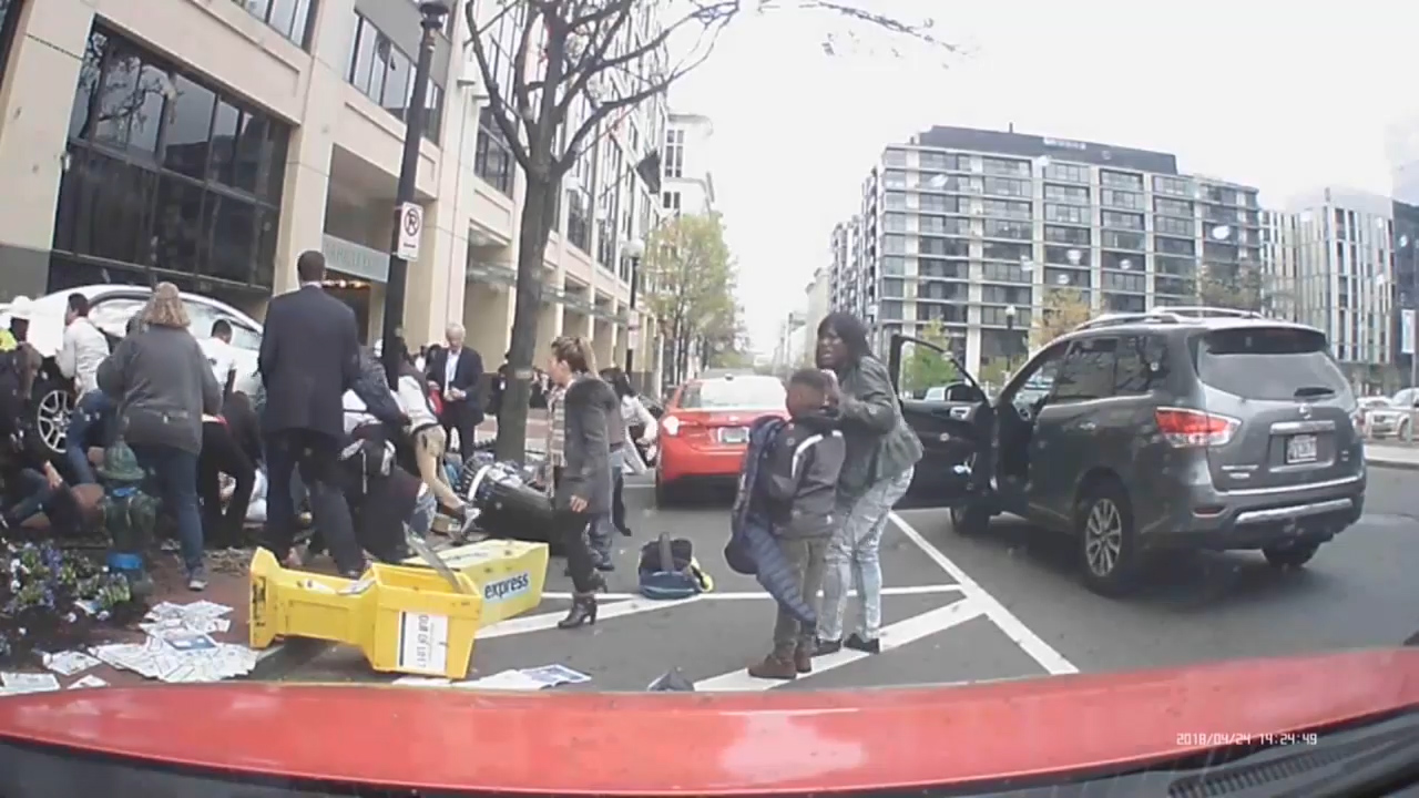 Washington DC crash Bystanders lift crashed car off pinned pedestrians