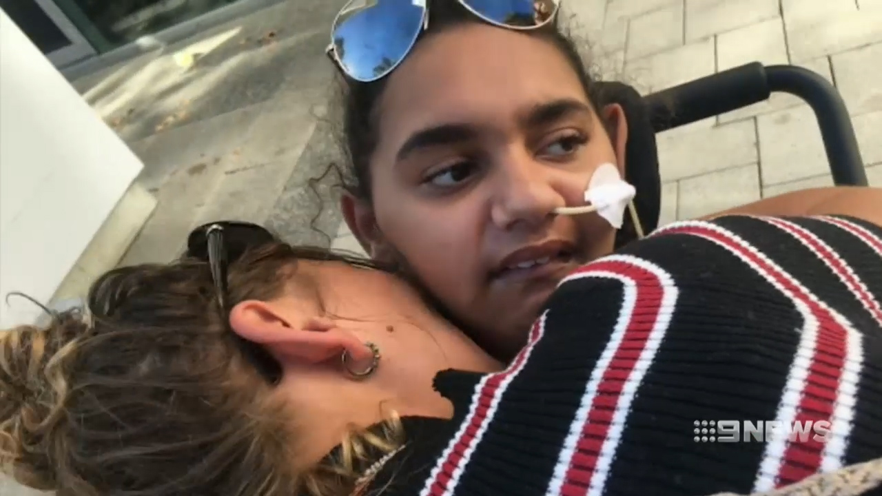 Electric shock victim Denishar Woods spends first night at home