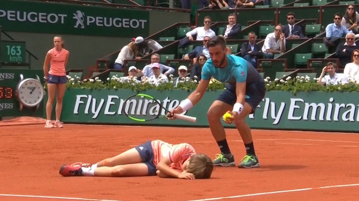 French Open tennis: Damir Dzumhur collides with Roland Garros ball kid in loss to ...