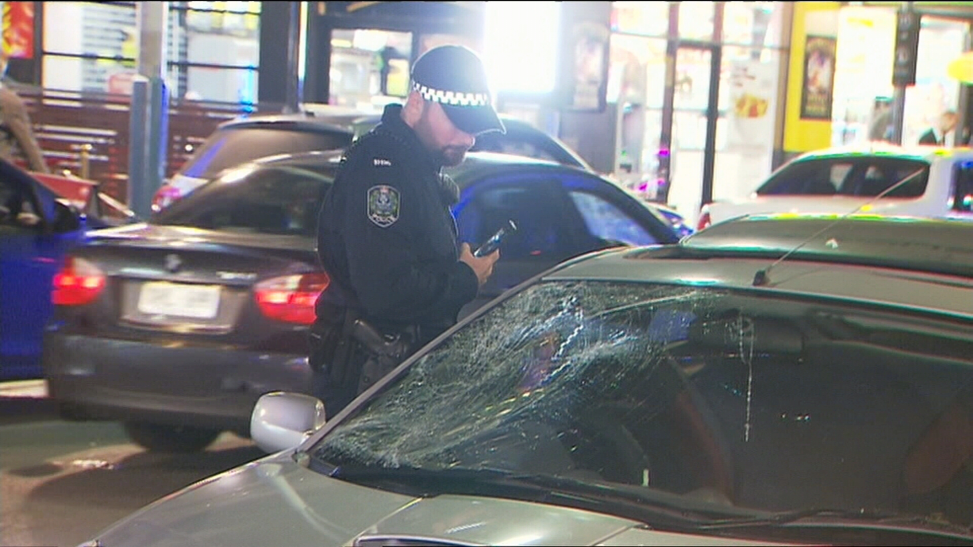Two pedestrians hit after stepping in front of car on busy Adelaide street