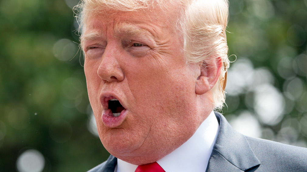 Trump to revoke clearance of Justice Department official in 'revenge' over wife's ties to notorious dossier