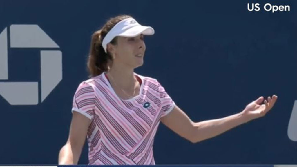 Alize slapped with code violation after changing shirt on court