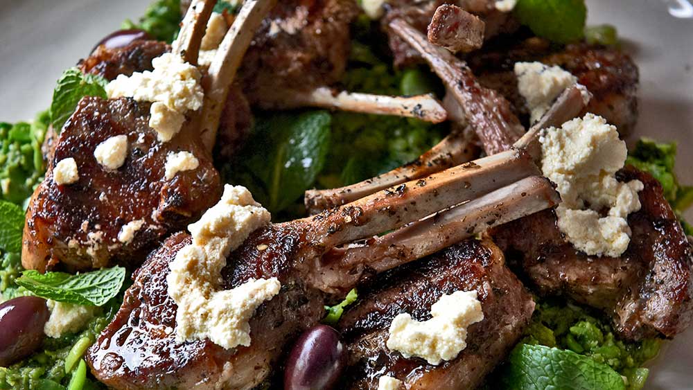 Karen Martini’s BBQ lamb with broad bean paste and hot feta dressing