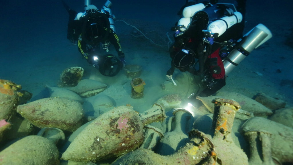 Divers Uncover Ancient Roman Relics In Mysterious Shipwreck Off Italian ...