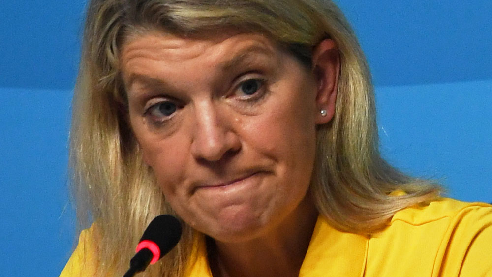 Australian athletes released by police after agreeing to fine