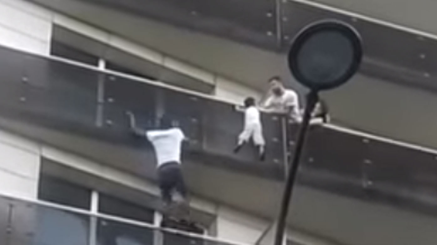 ‘Real life Spiderman’ climbs four floors to rescue boy hanging off