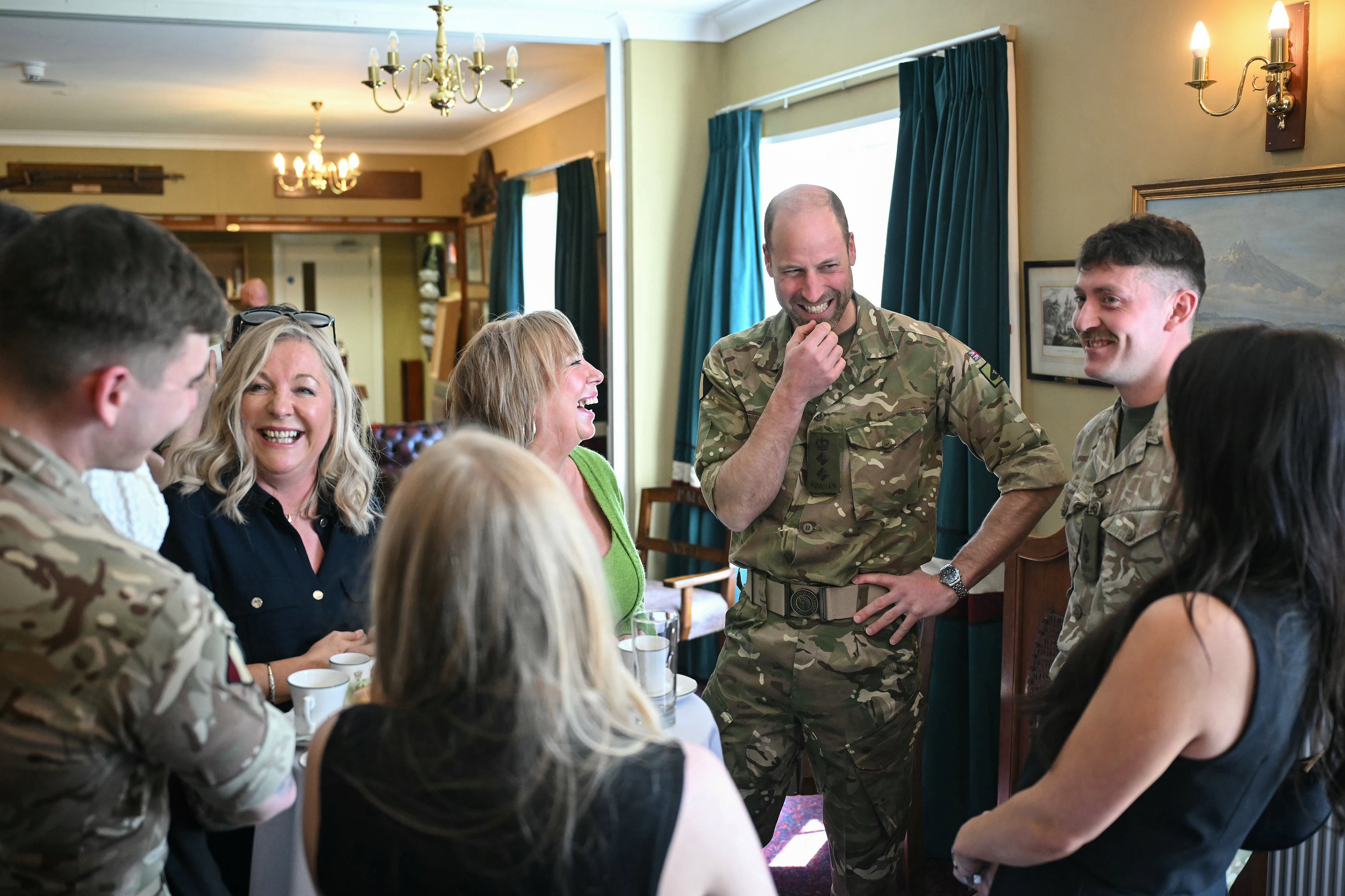 Prince William jokes about shaving off beard during army visit