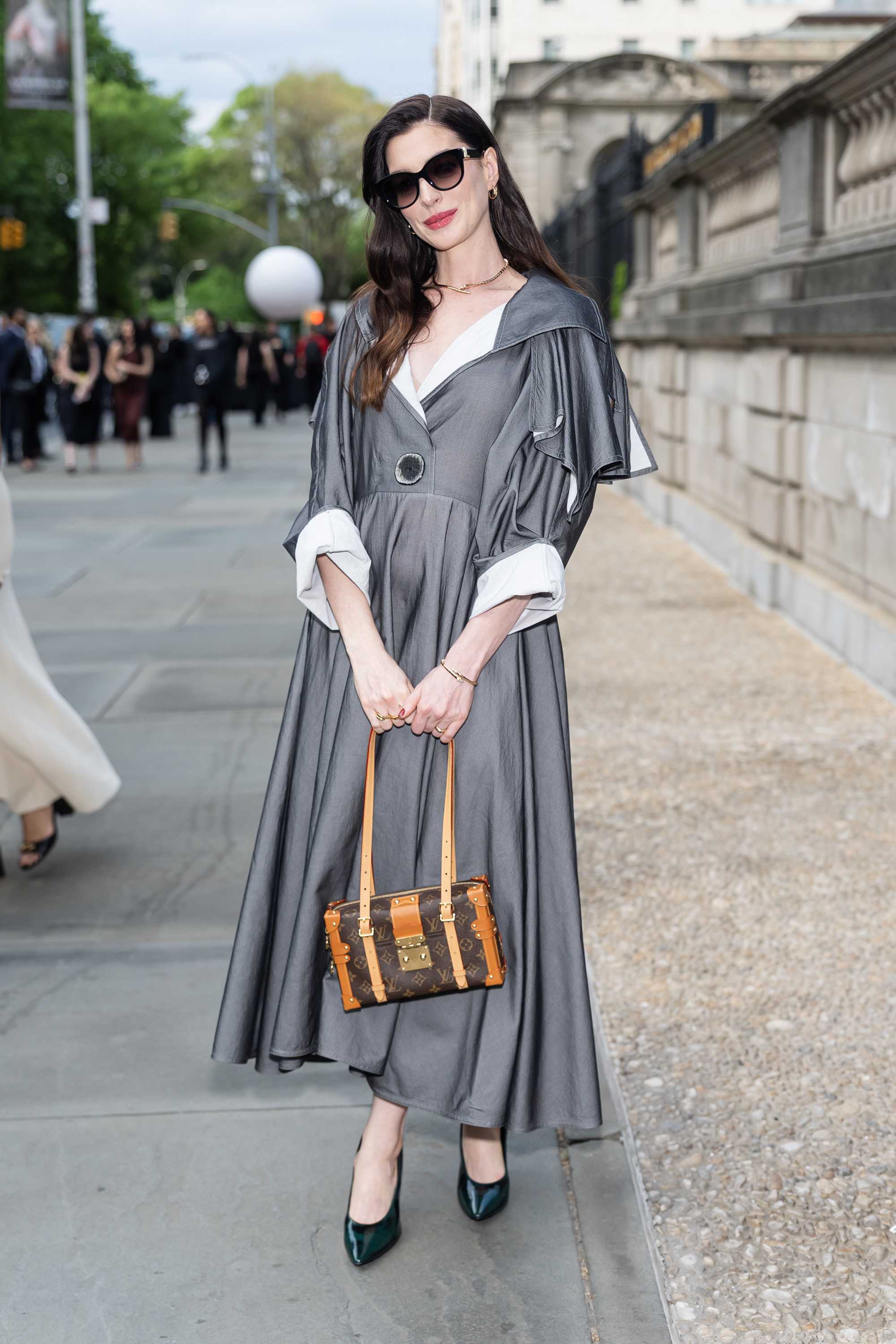 Anne Hathaway responds to plastic surgery speculation: 'It's just two braids'