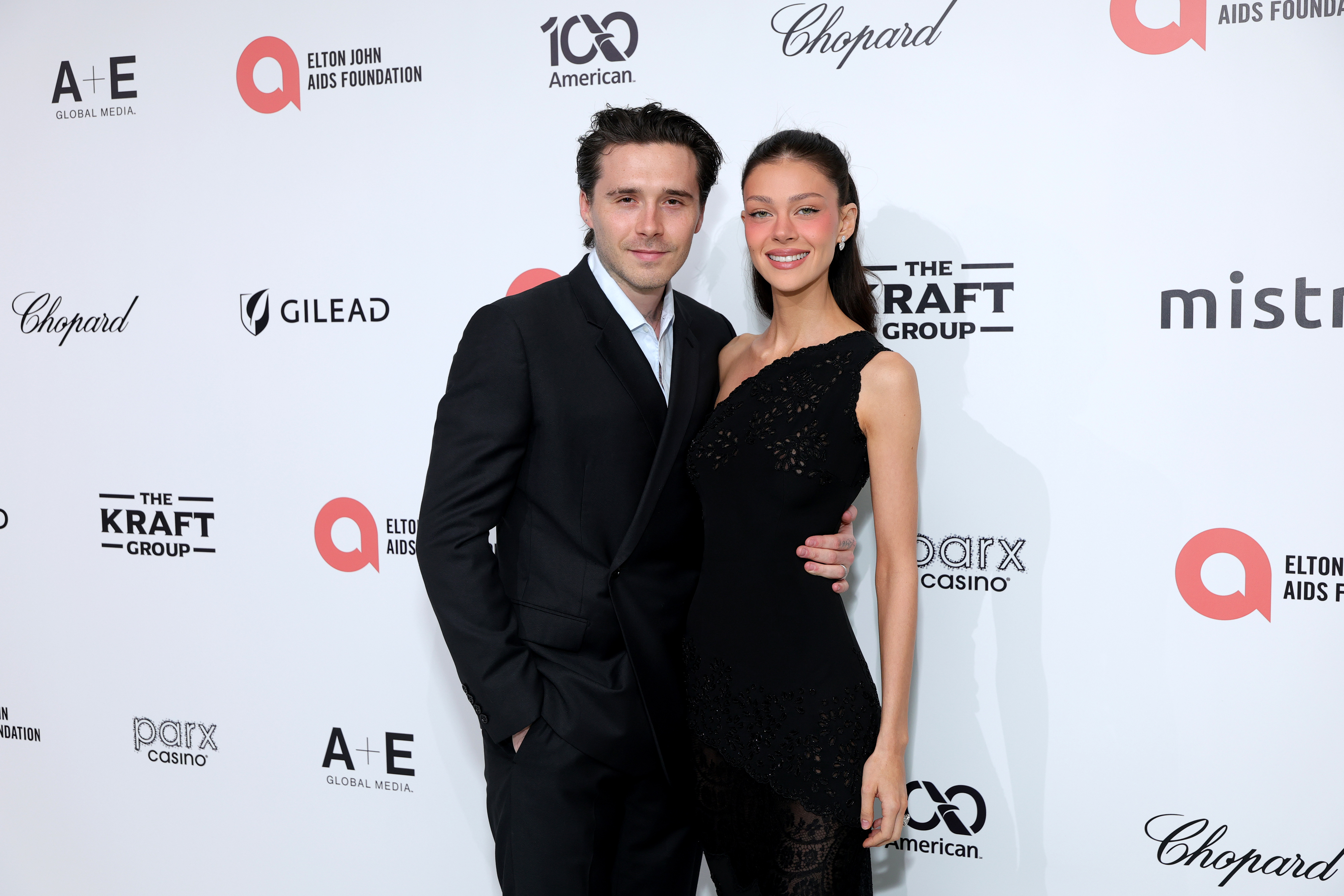 Brooklyn and Nicola turn heads at godfather Elton John's Oscars party