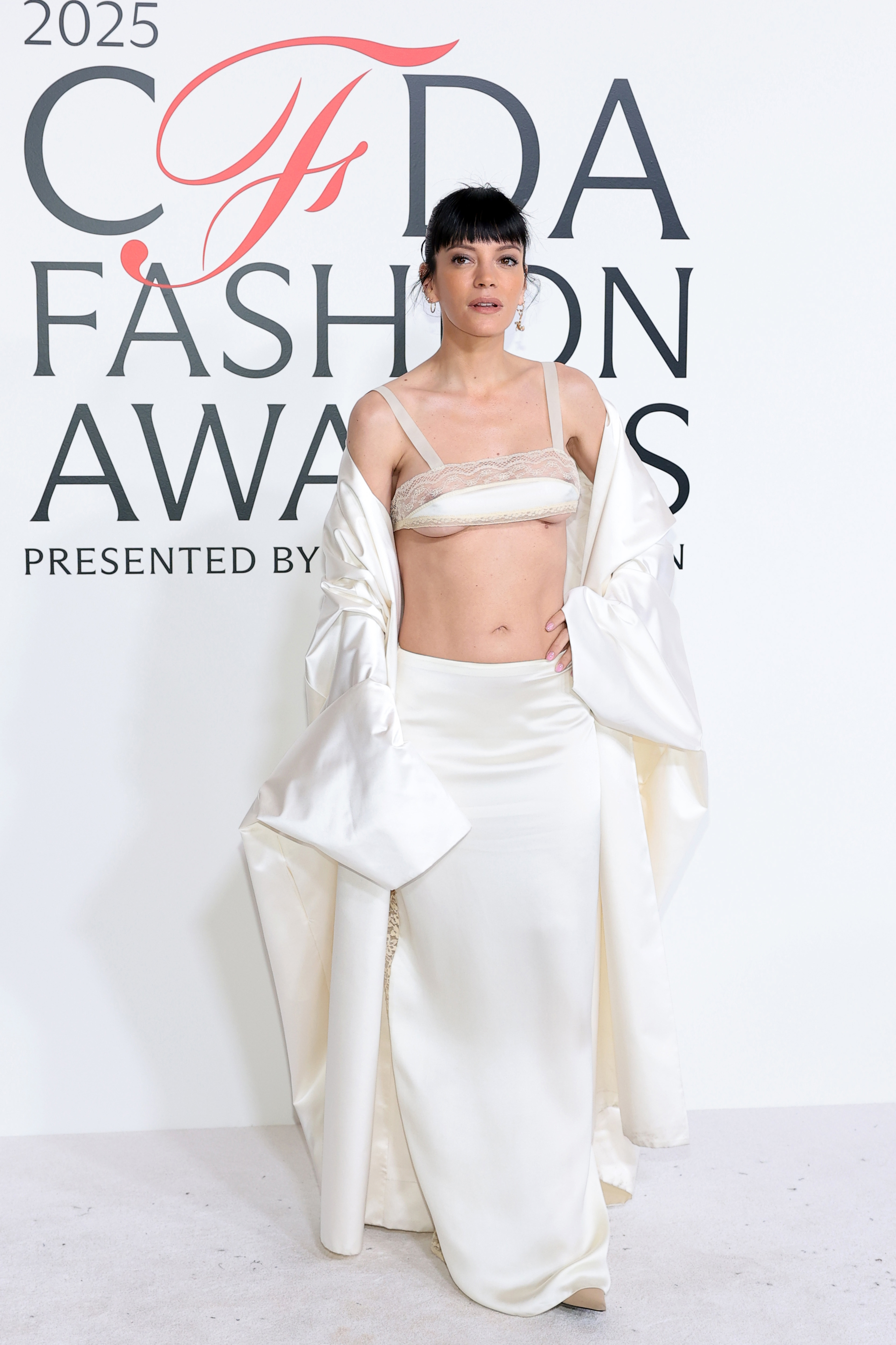 Lily Allen turns heads in a 'revenge dress'-inspired look as she leads red carpet arrivals at the 2025 CFDA Fashion Awards