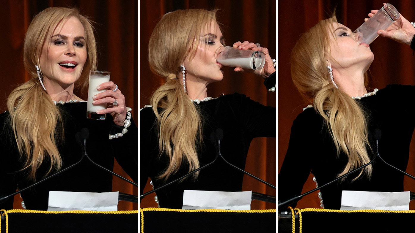 Nicole Kidman drinks glass of milk on stage at National Board of Review 2025 gala in recreation of Babygirl scene