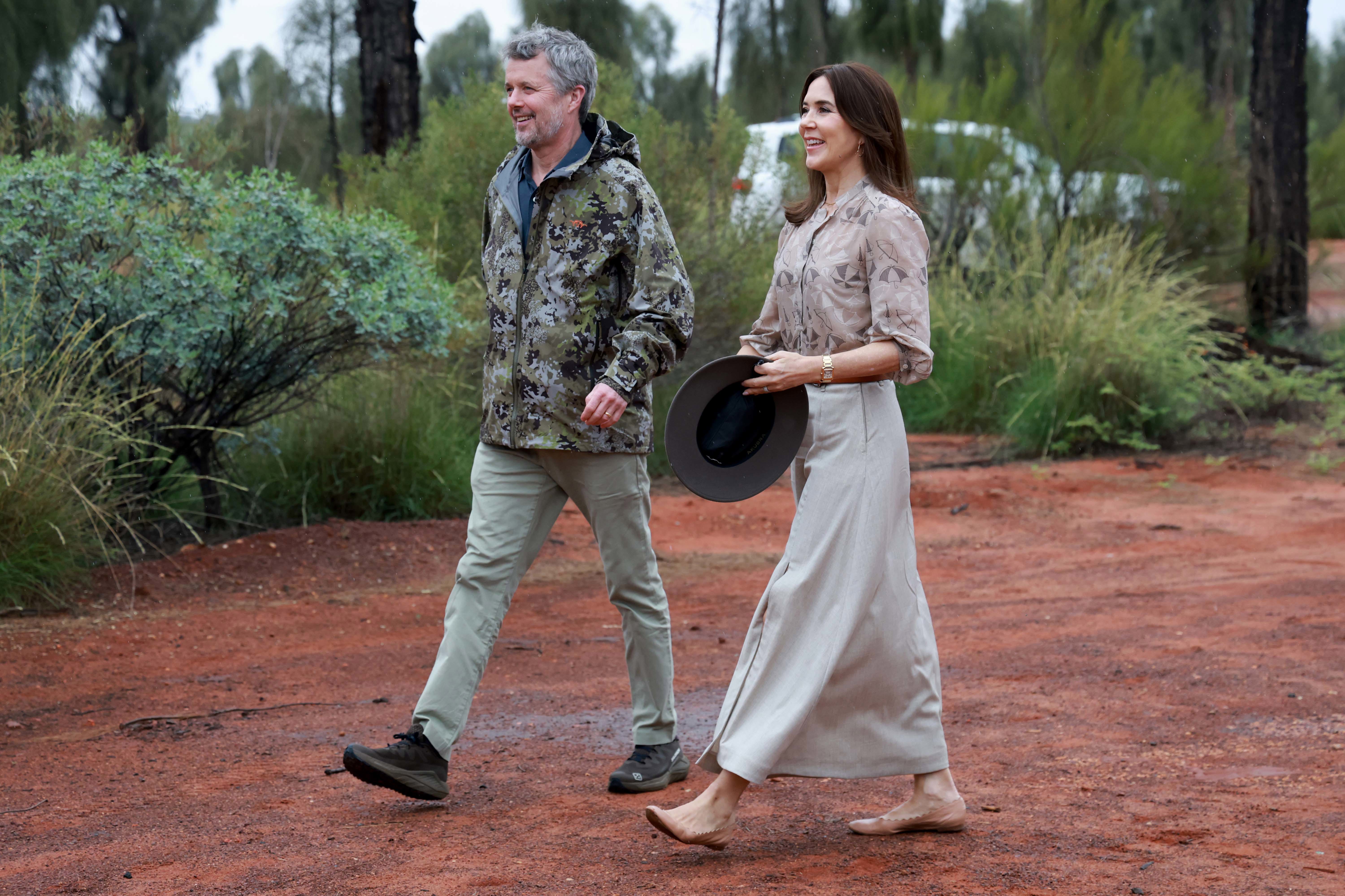 Queen Mary and King Frederik watch sunset at Uluru as they begin Australian tour