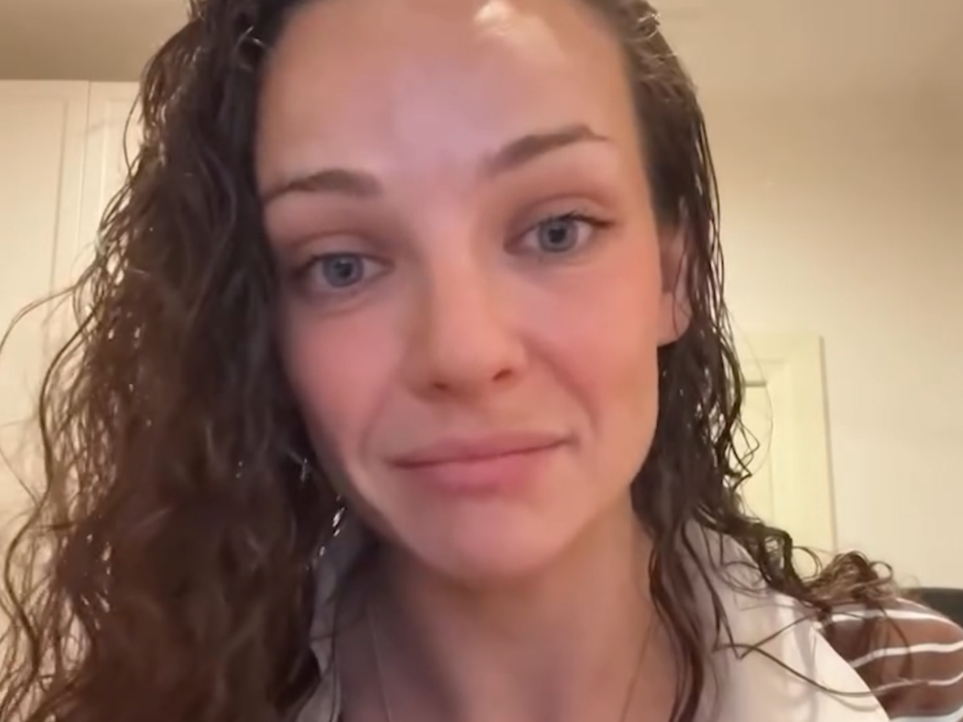 'Really regret it': Abbie Chatfield apologises for resurfaced video a day after boyfriend Adam Hyde denied US entry
