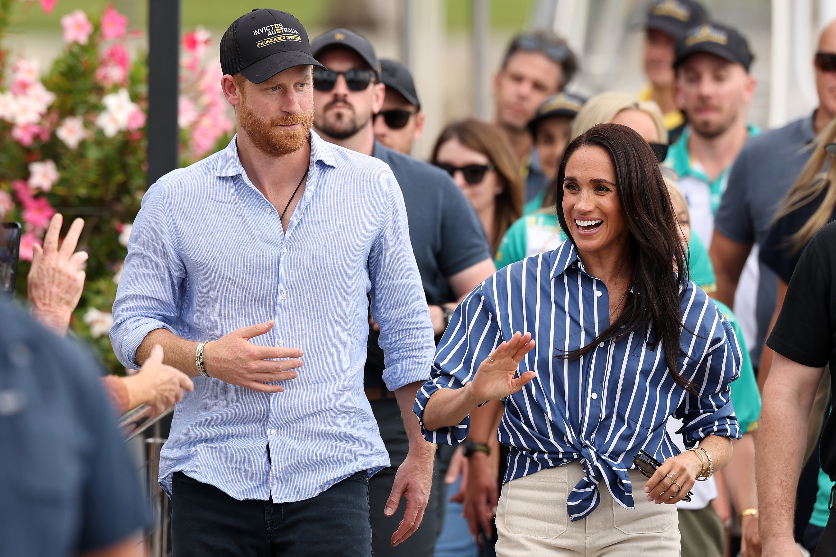 'The Sussex charm has not worn off': Meghan and Harry embraced by fans in Sydney on the final day of Australia tour