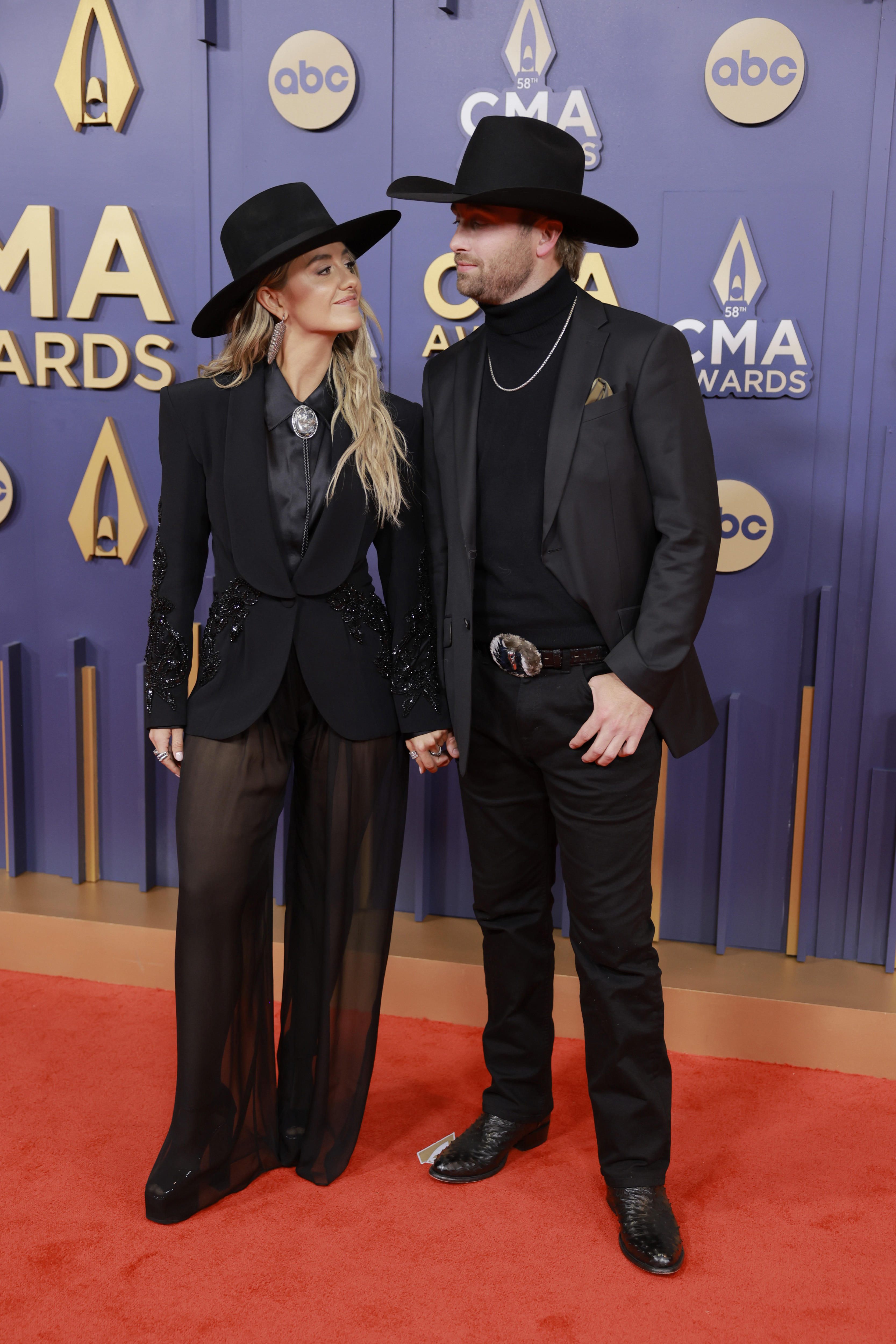 'We're hitched!' Country music star Lainey Wilson marries Devlin Hodges in lavish Tennessee waterfall wedding