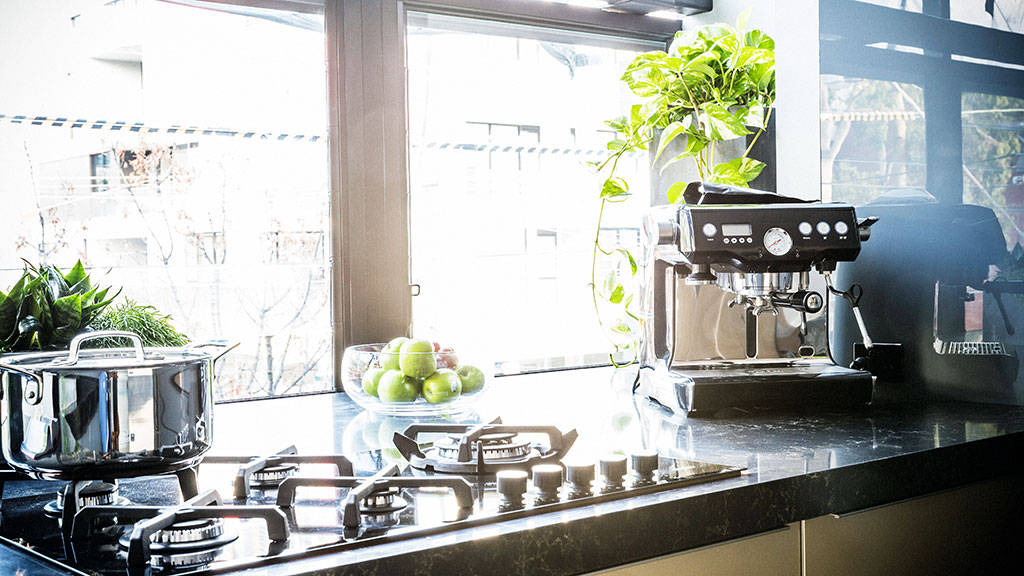 Neale loved the cooktop placement in front of the big windows overlooking the street.