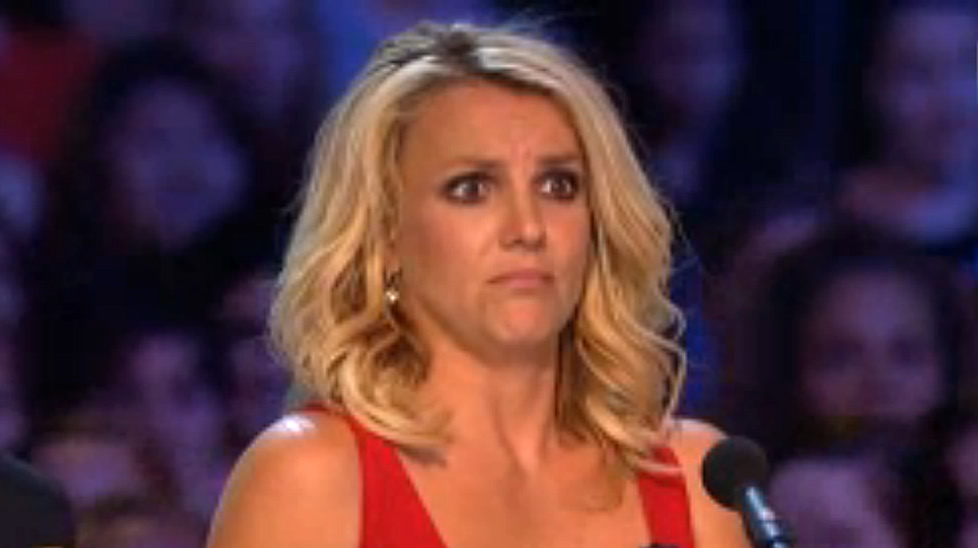 Britney Spears reacts to a contestant on X Factor.