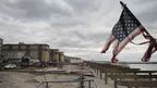 A battered American flag on Rockaway Beach, in the New York borough of Queens. (AAP)