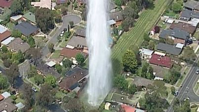 Water from the burst main is flooding nearby houses