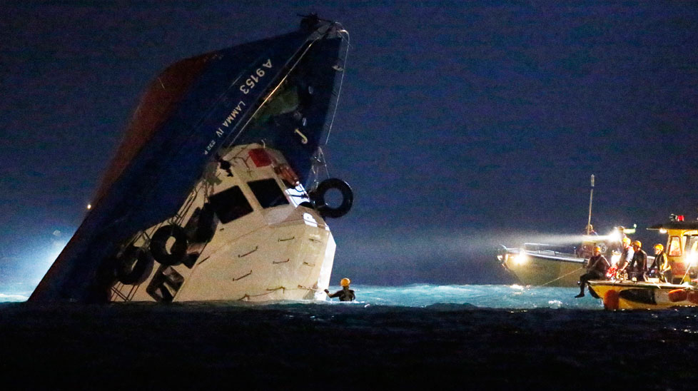 Dive teams searched the sunken boat for survivors. (All images AAP)