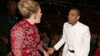 Adele appears to berate Chris Brown at the Grammys moments after he was seen sitting through a standing ovation for Grammy winner and rival Frank Ocean. 