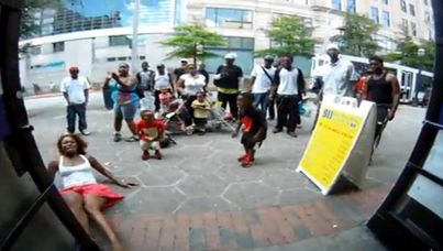 The woman falls to the ground after being tasered.