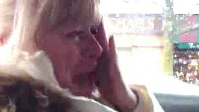 A US woman cries during the trip home after watching Les Miserables.