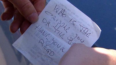 The offensive note left on Ms Ludwell's windscreen. (A Current Affair)