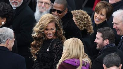 Beyonce and Jay-Z share a laugh with singer Kelly Clarkson.