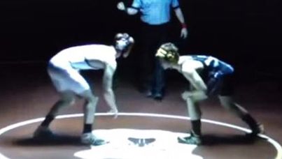 The two teens prepare to wrestle before the accident.