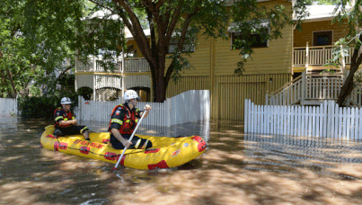 Floodwaters  in Torwood street, in the inner city suburb of Rosalie in Brisbane. (AAP)