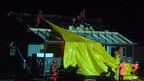 Emergency services work hard to cover a house damaged in the sudden storm.