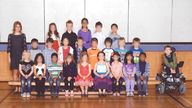 The school photo showing Miles Ambridge separated from his classmates.