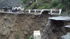 Fatal floods wash away houses, destroy roads in India 