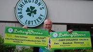 Cary Collings with cheques for his winnings. (Facebook) 