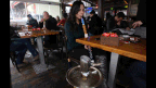 A woman smokes a hookah, or water pipe, at a cafe in Ankara, Turkey. (Getty)