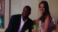 Dwyane Wade with student Nicole Muxo.