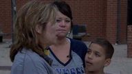 'Hero' teacher Rhonda Crosswhite with mother Brandi Kline and her son Damian Britton.