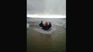 The US tourists sit stranded on an iceberg in Iceland.