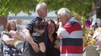 Slain soldier's family visit murder site